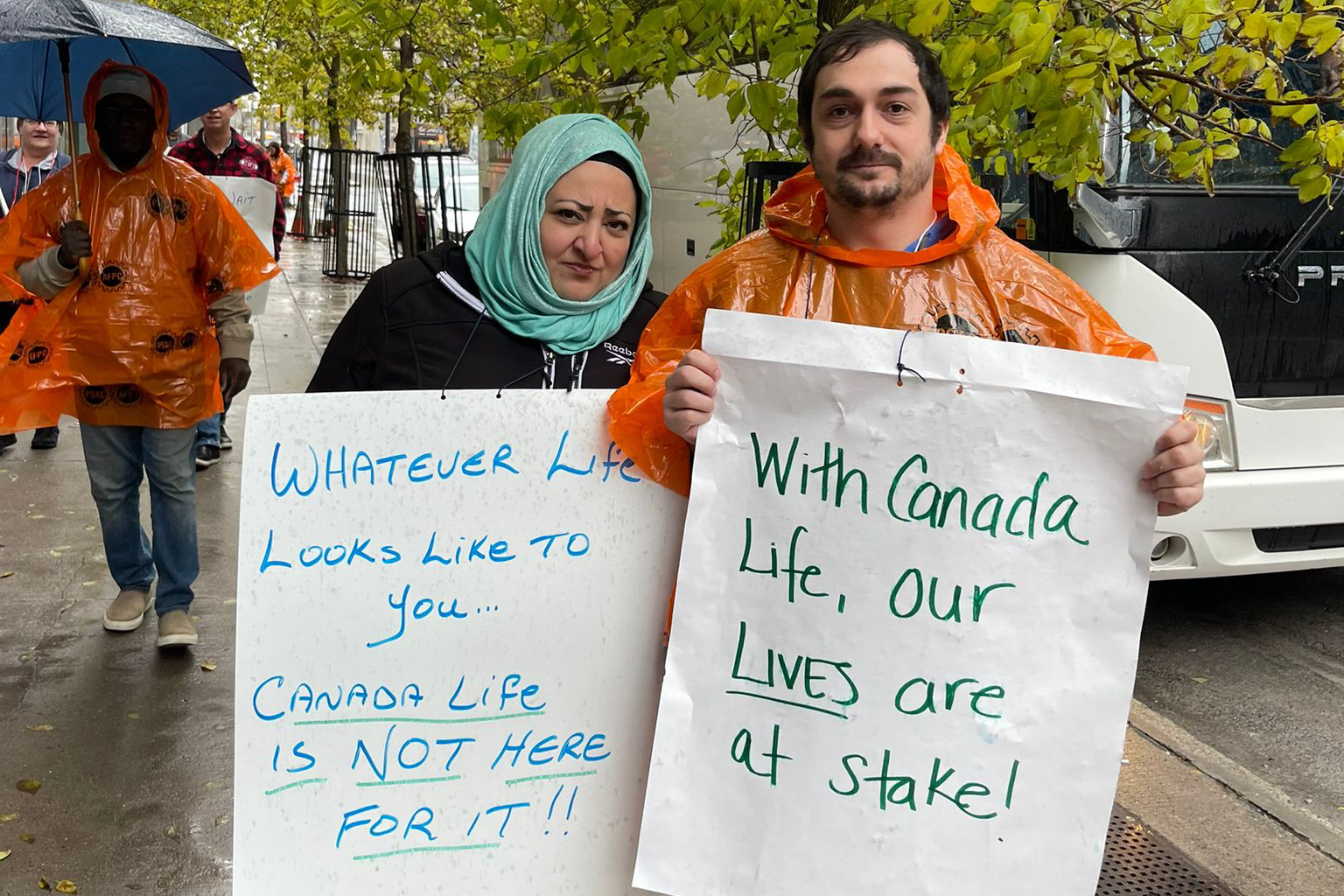 Members with signs - Canada Life Demonstration in Ottawa