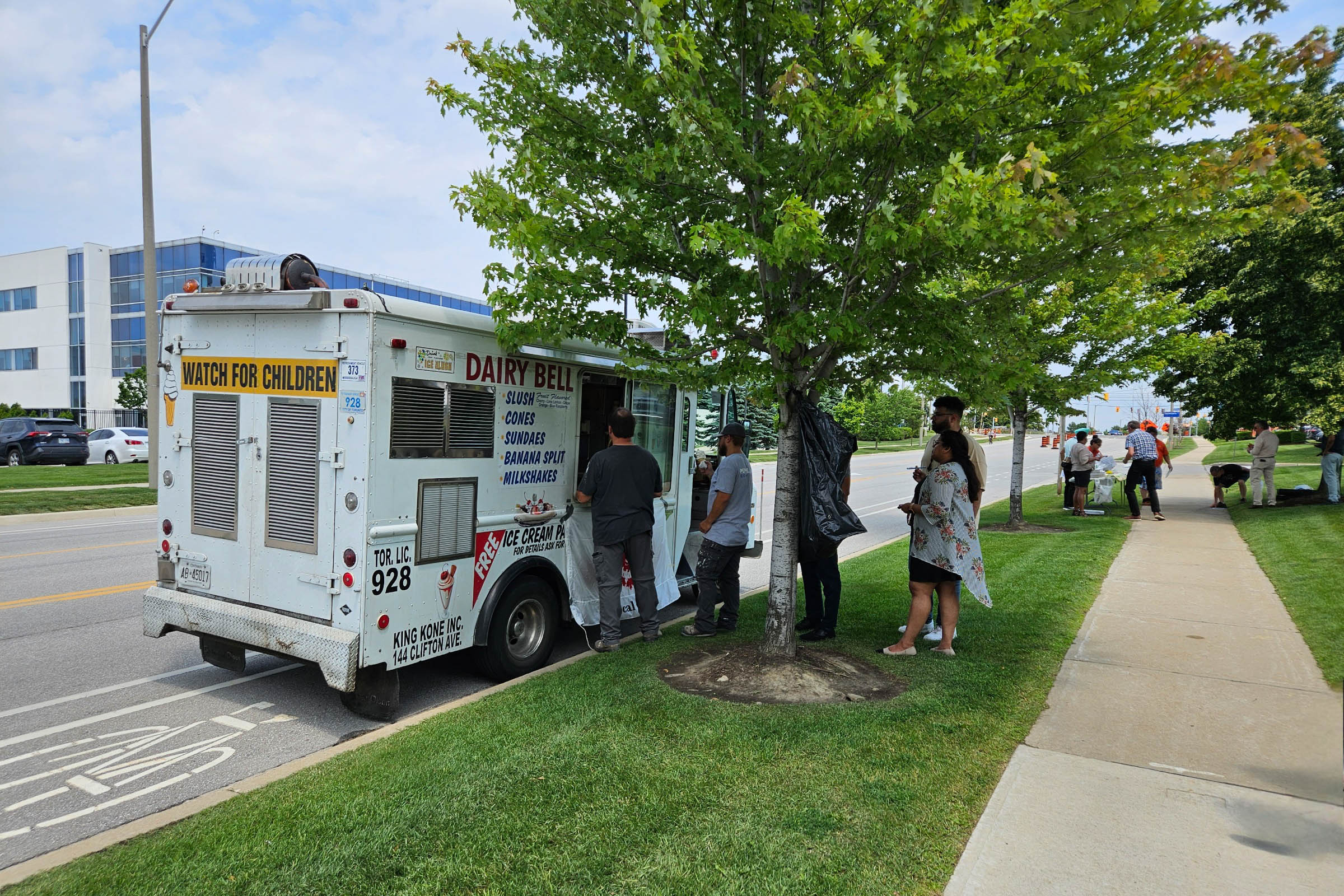 people in front of an ice cream truck