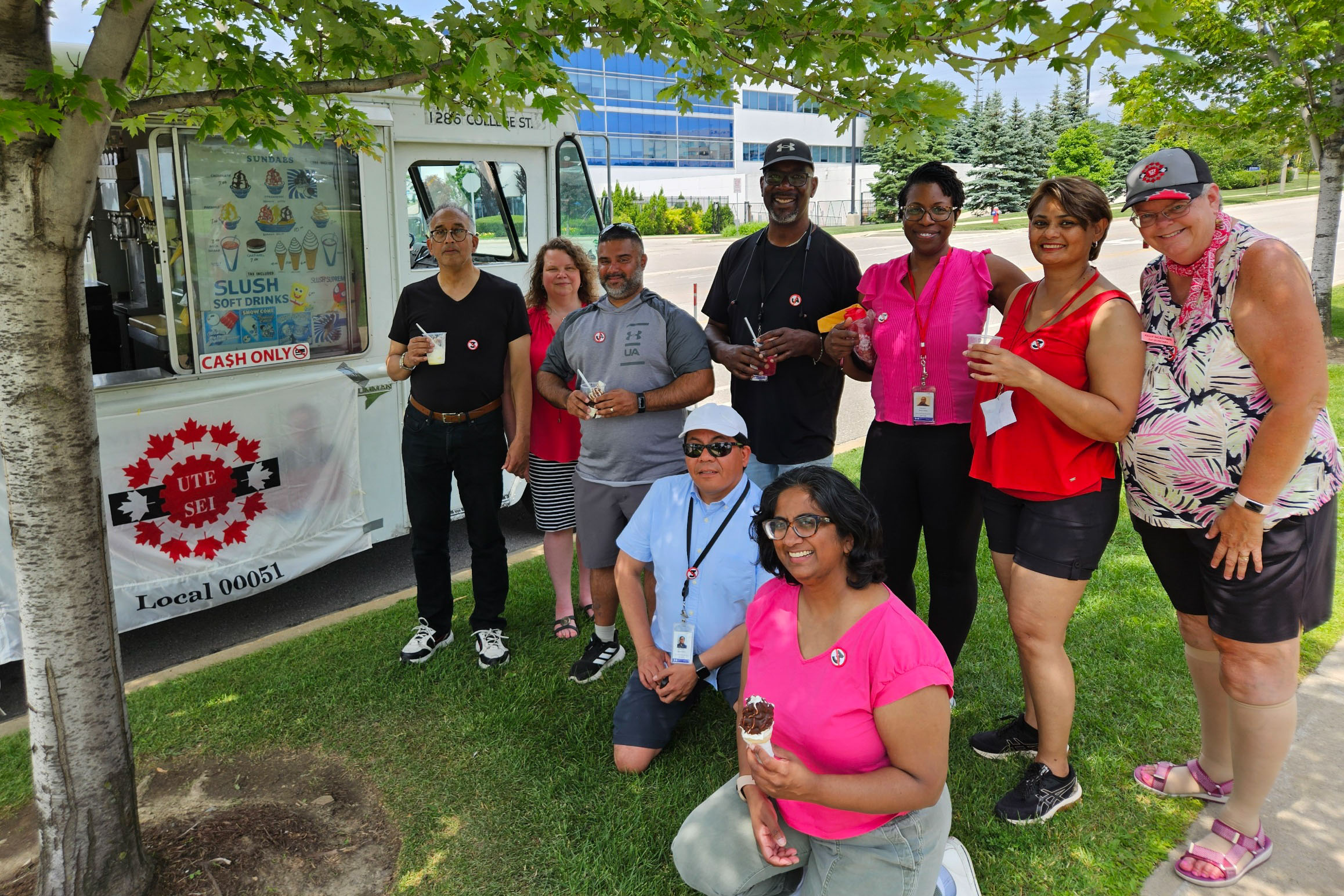 members in front of the ice cream truck