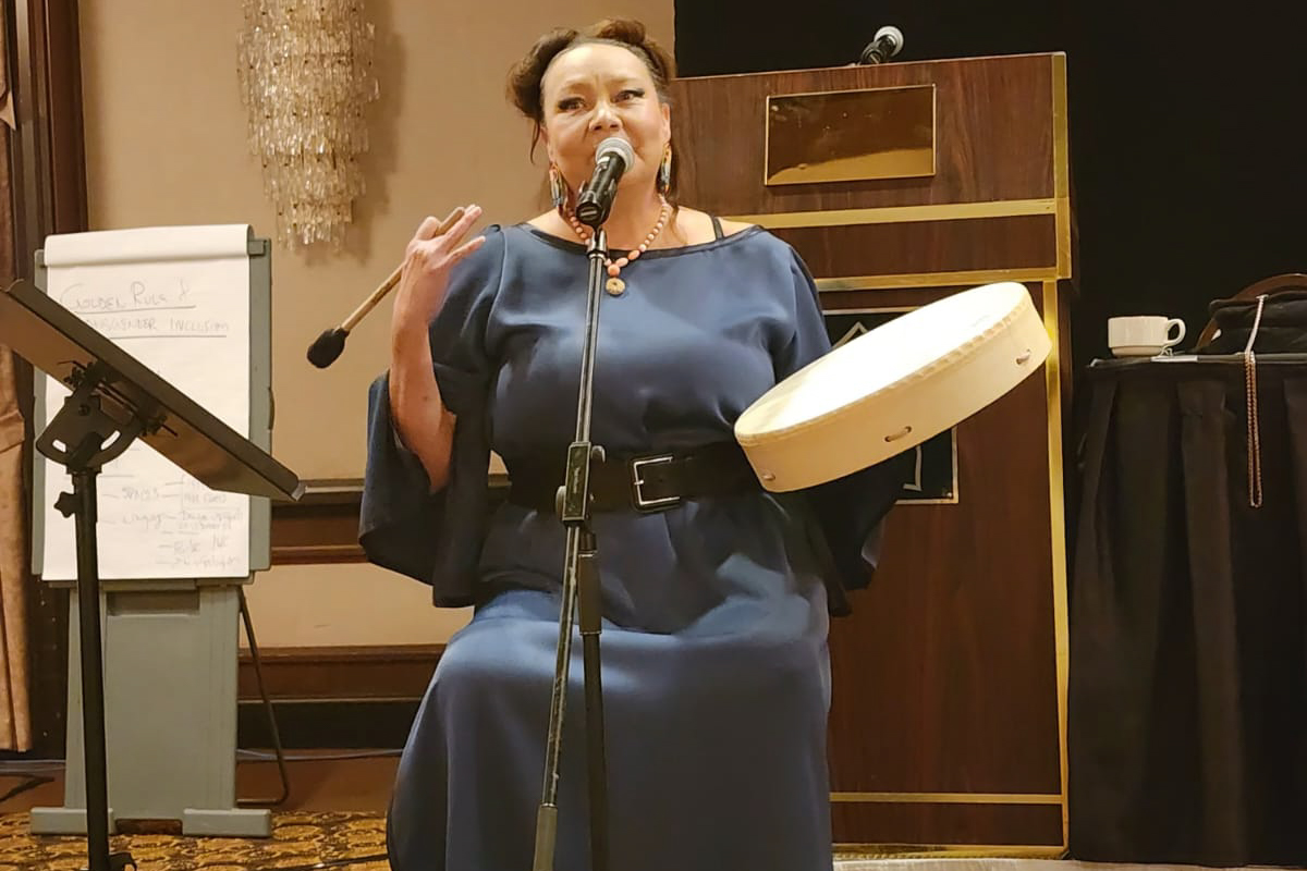 woman holding a hand drum