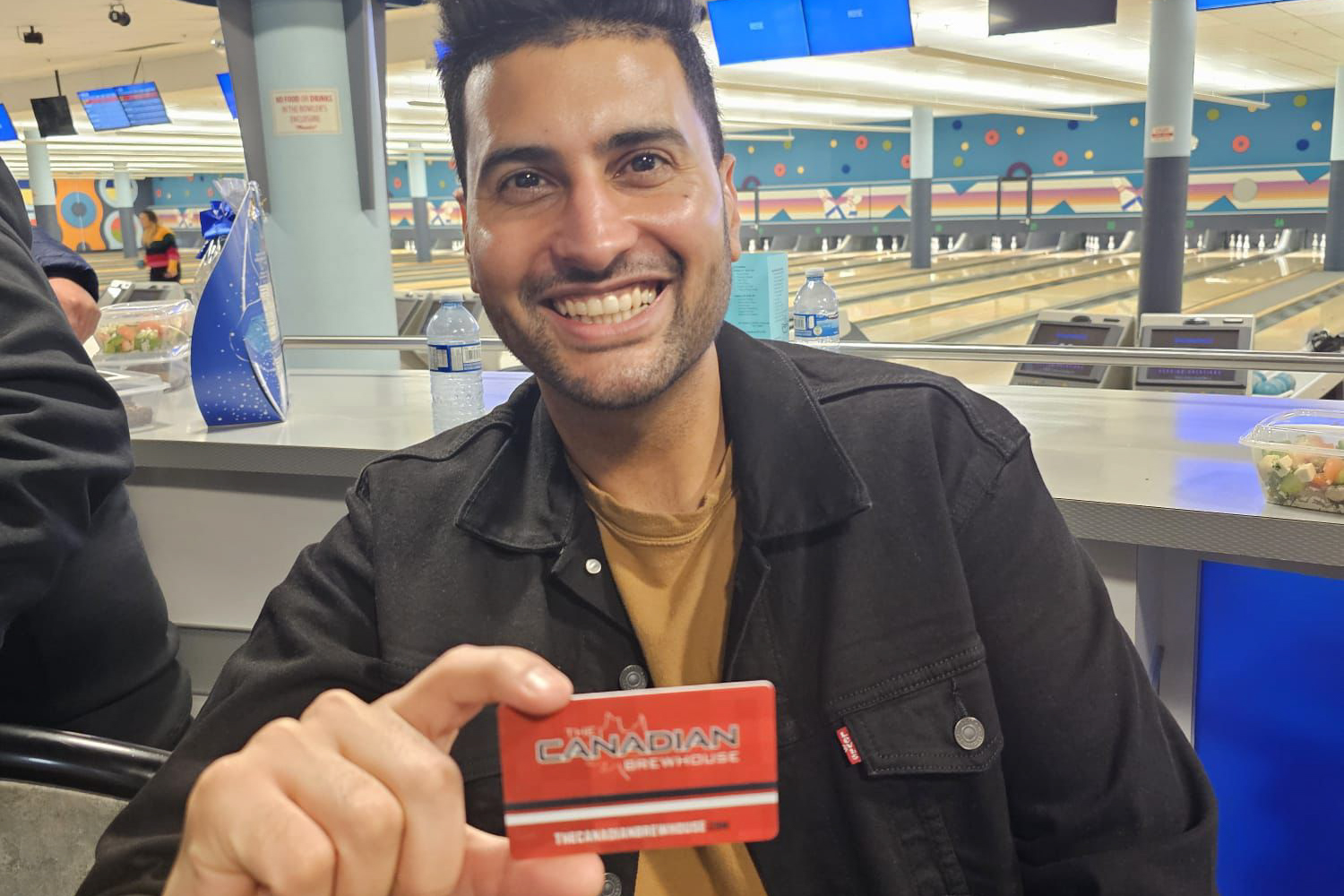 member receiving a prize