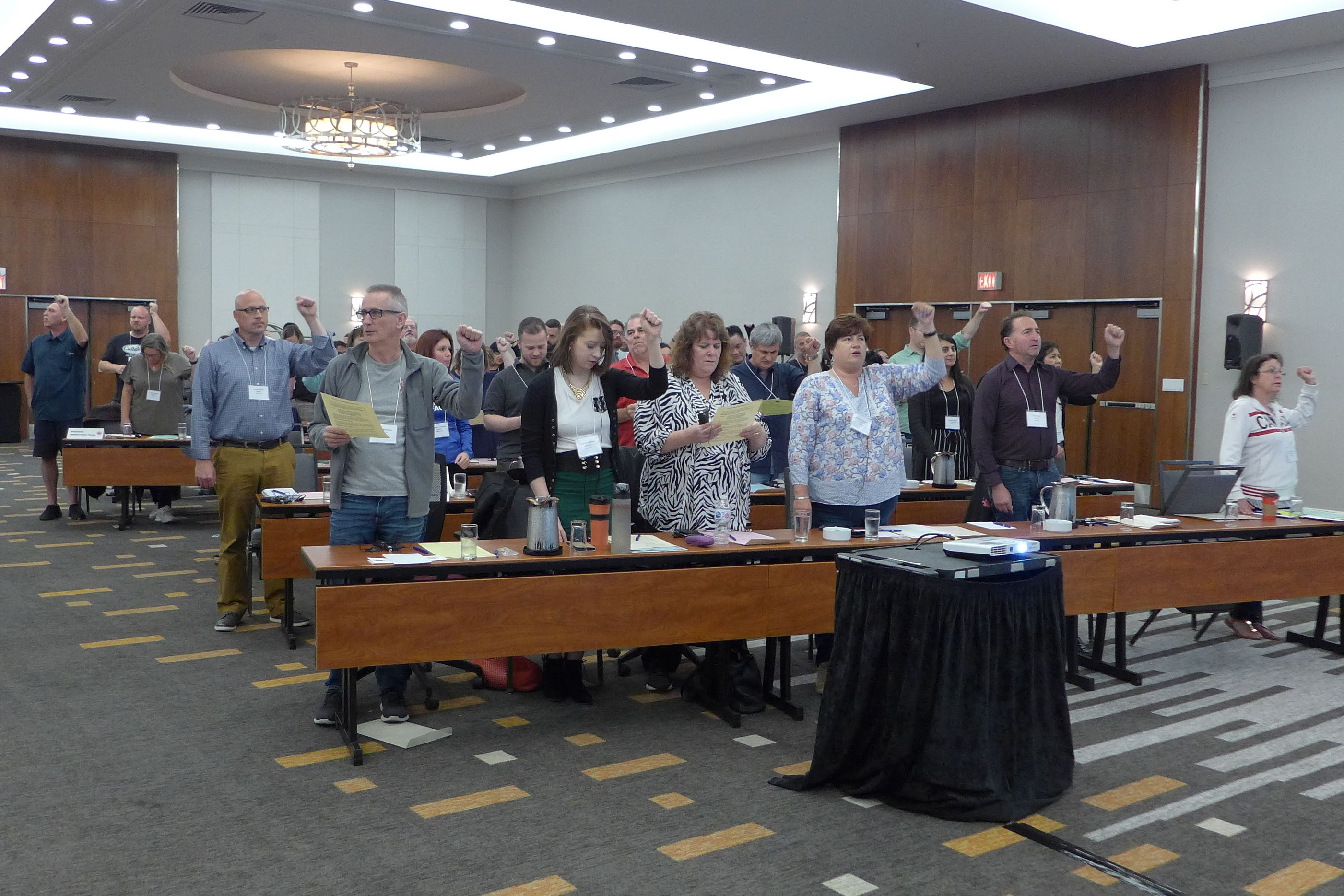 Observers singing Solidarity Forever