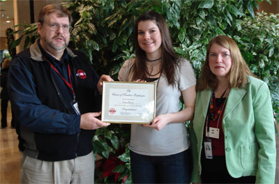 Charissa receives her certificate