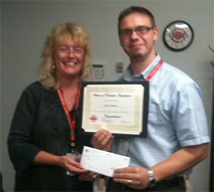 David Fandrich receiving his cheque