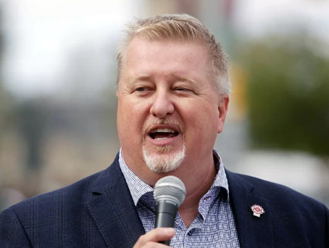 Marc Brière with a microphone