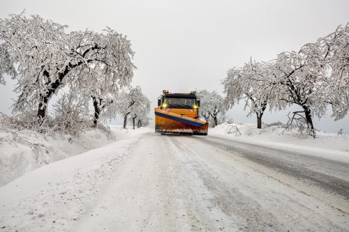 snow plow clearing the road